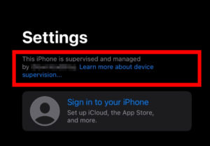 ข้อความเตือนบน iPhone ว่าเครื่องอยู่ภายใต้การจัดการของบริษัท